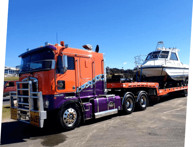 Truck Towing A Yacht — Towing Services in Mid North Coast