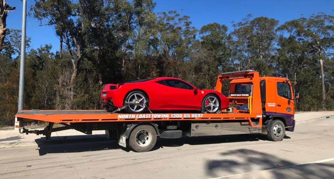 Ferrari Car Towing By North Coast Heavy Towing Team — Towing Services in Mid North Coast